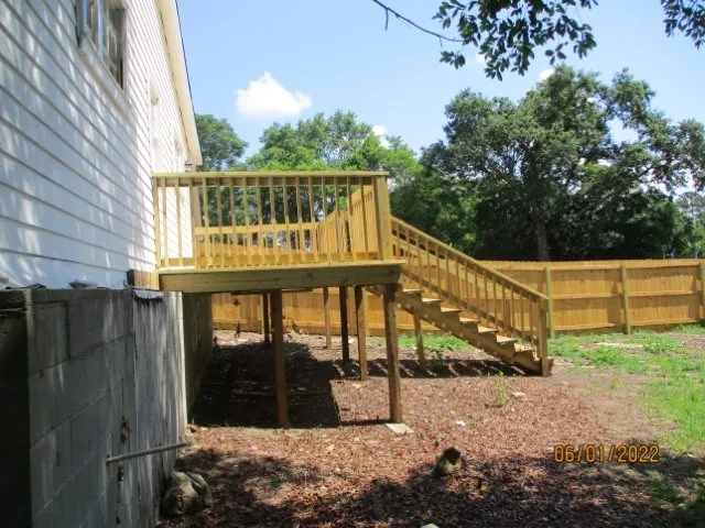 a view of wooden balcony with outdoor space