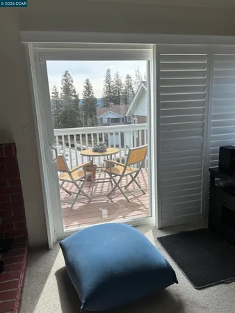 a view of balcony and wooden floor