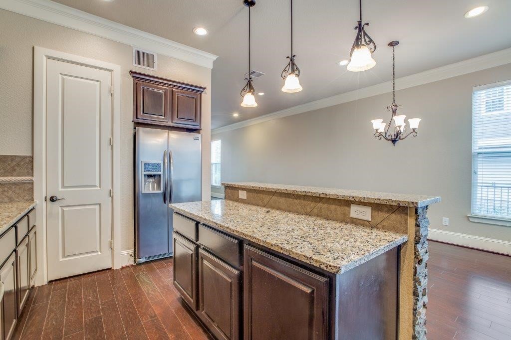 46 East Rafters Row The Woodlands, TX 77380 - Photo 10 of 25 Large pantry, generous storage, and refrigerator included for added convenience.