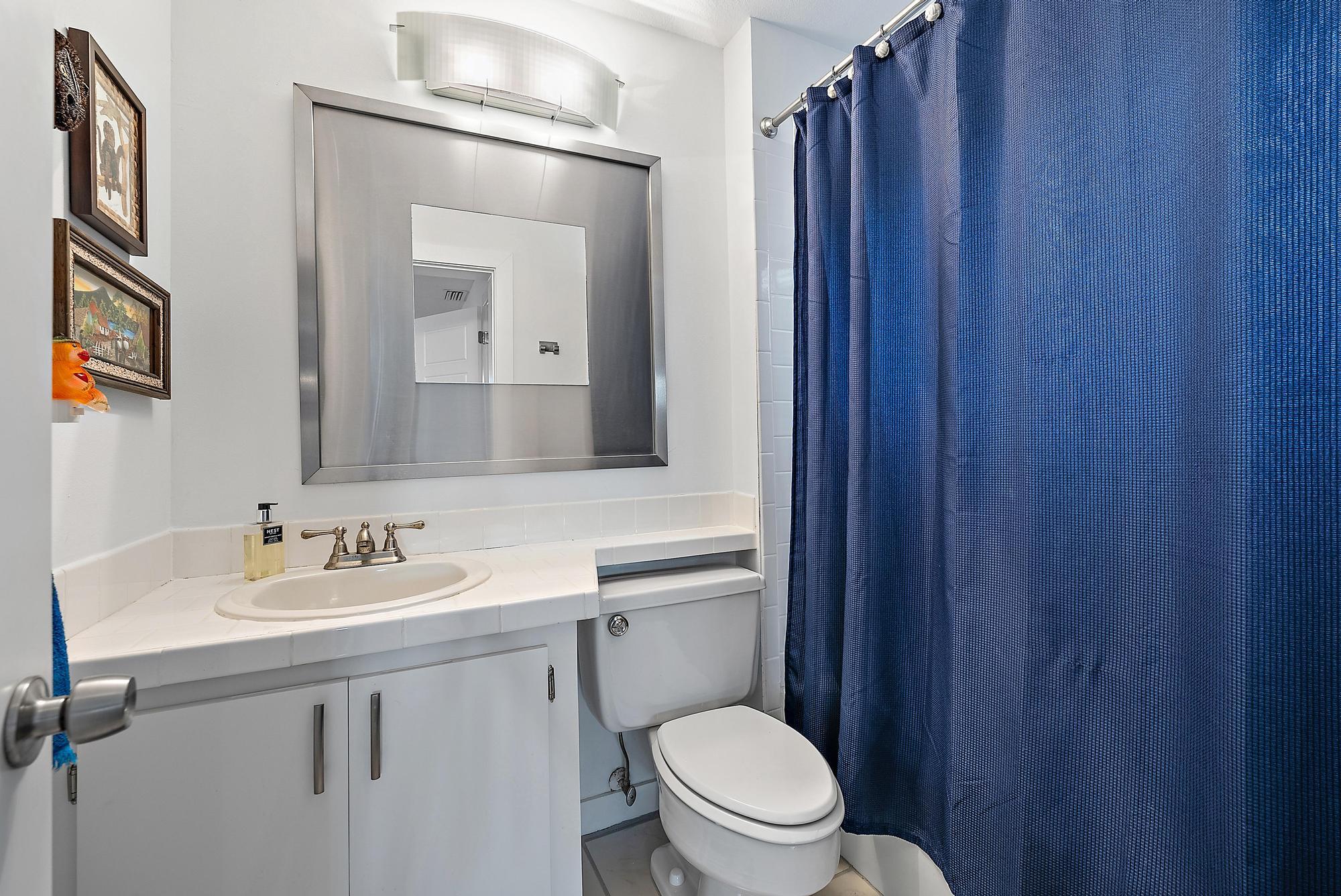 1605 Highway 1, Unit 16F Jupiter, FL 33477 - Photo 14 of 19 First Floor Bathroom