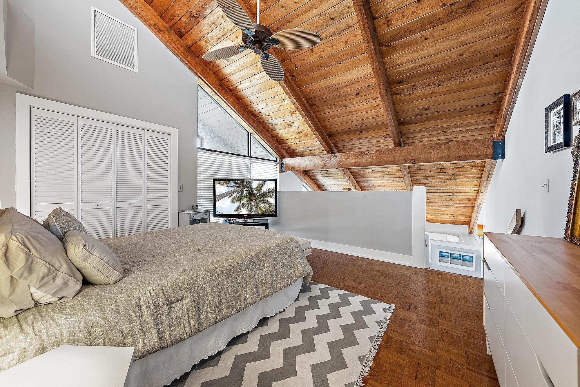 1605 Highway 1, Unit 16F Jupiter, FL 33477 - Photo 16 of 19 Second Floor Bedroom