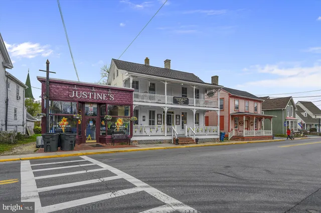 a front view of building with street