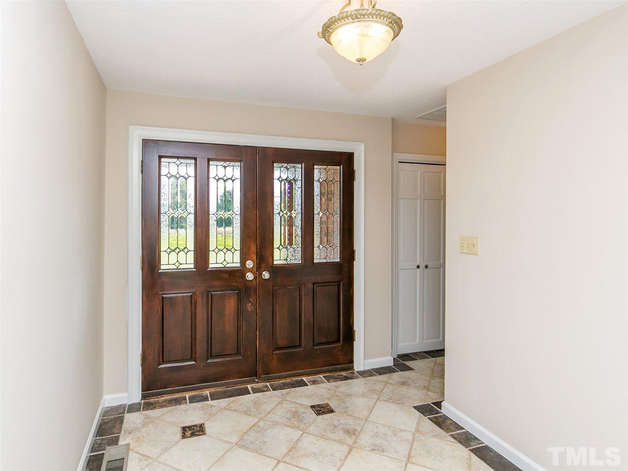 2524 Win Road Garner, NC 27529 - Photo 3 of 25 Tiled front entry with side coat closet.