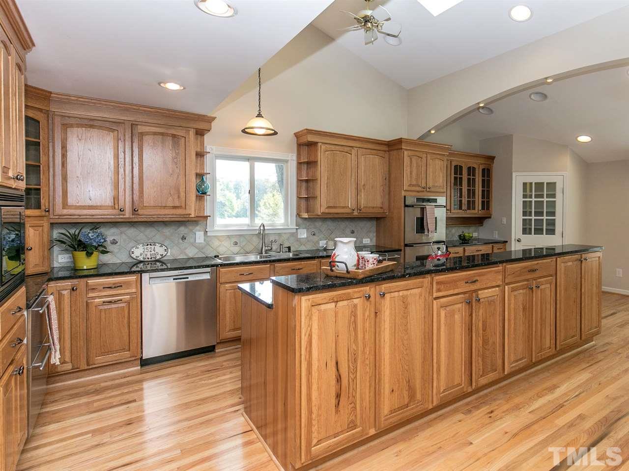 2524 Win Road Garner, NC 27529 - Photo 6 of 25 Granite, stainless appliances, refinished hardwoods, skylights, large pantry, new ice maker appliance, new Bosch dishwasher, large breakfast table area that could seat 6-8.
