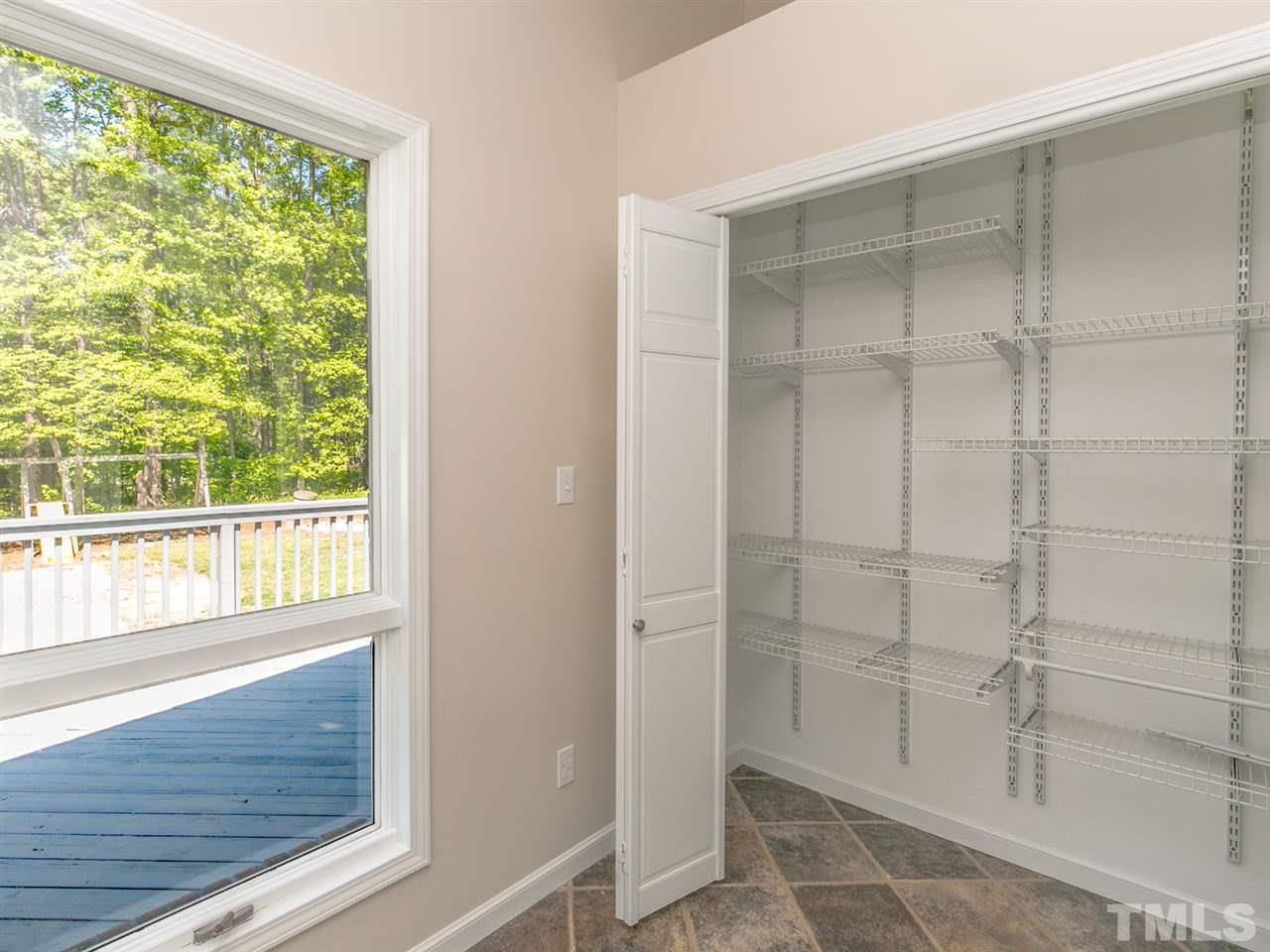 2524 Win Road Garner, NC 27529 - Photo 7 of 25 Great room for canning supplies, small kitchen appliances or a mudroom.