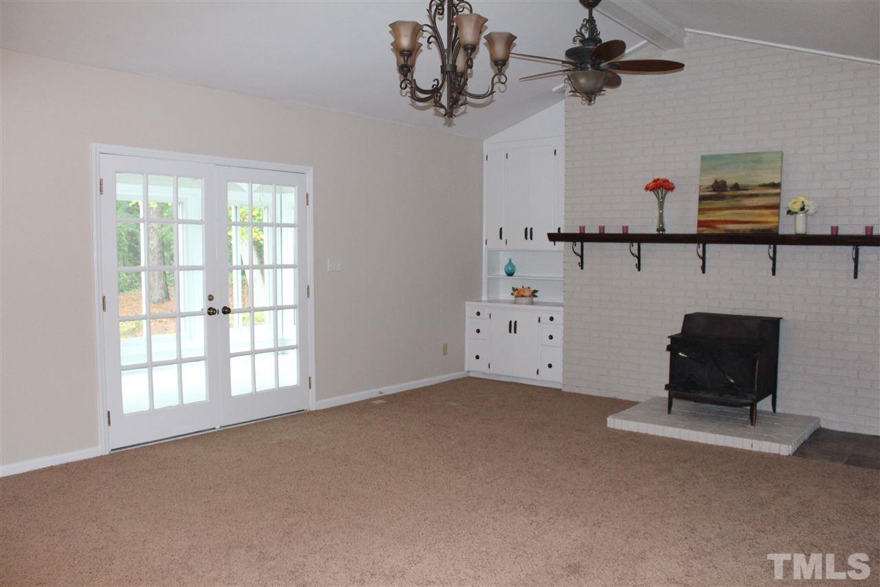 2524 Win Road Garner, NC 27529 - Photo 8 of 25 Large room with wood burning stove