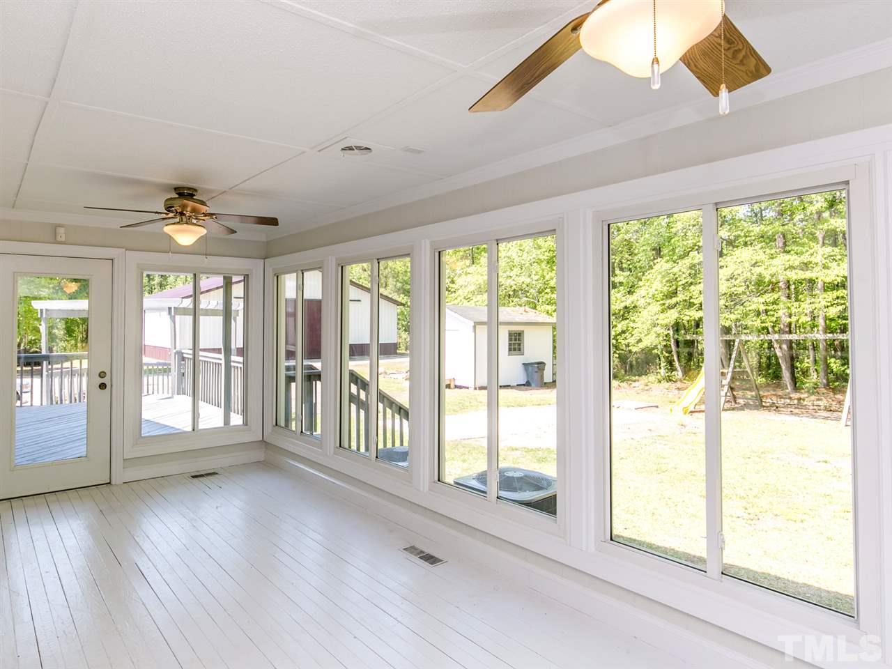 2524 Win Road Garner, NC 27529 - Photo 10 of 25 Windows slide to the side so you can enjoy the spring and fall breeze.