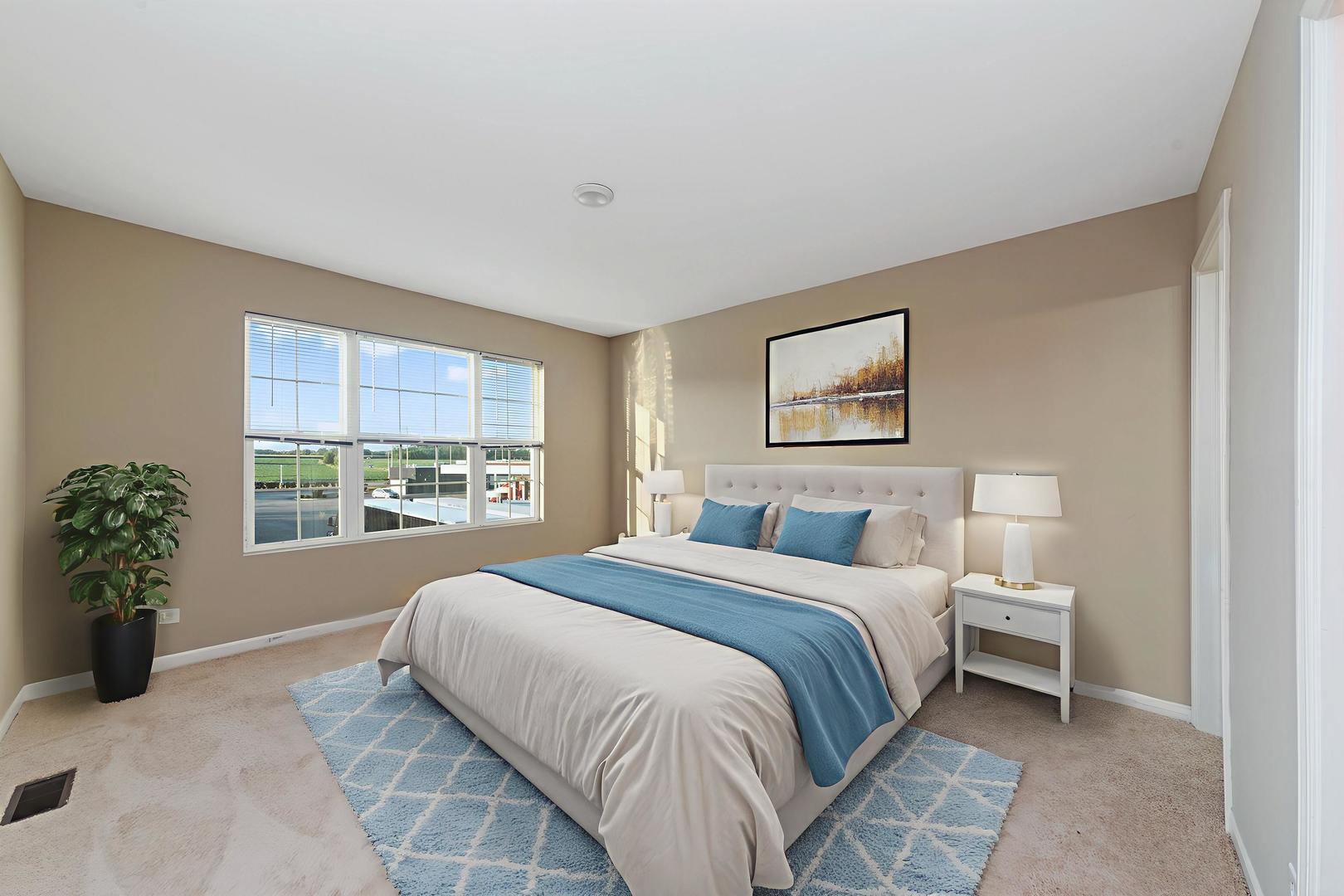 2303 Upland Road Pingree Grove, IL 60140 - Photo 8 of 17 a bedroom with a large bed and a window