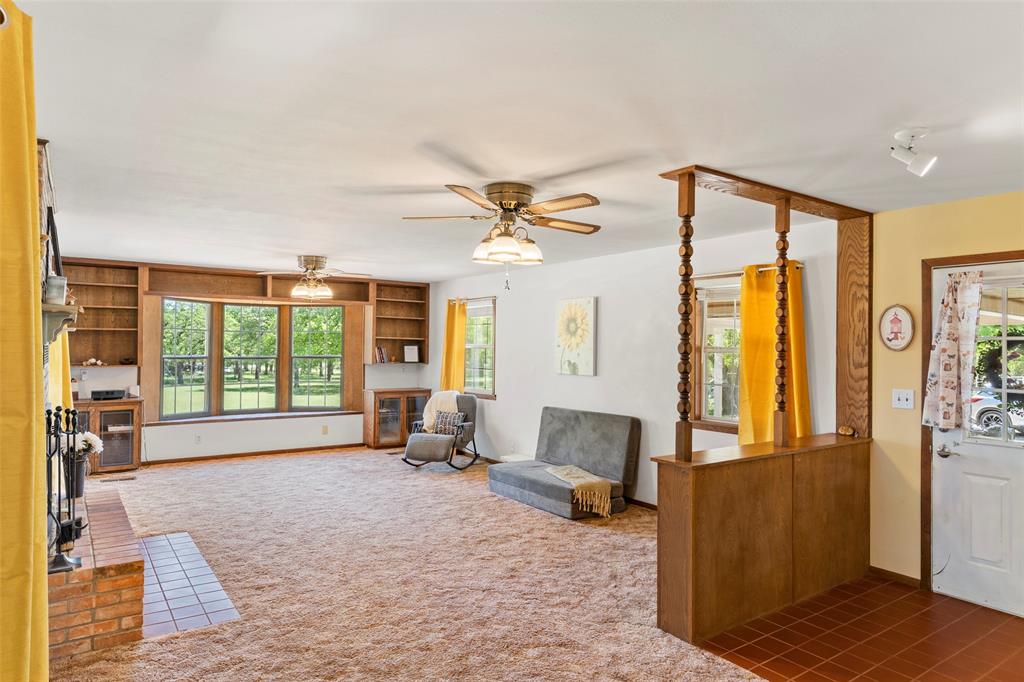 1500 County Road 404 Comanche, TX 76442 - Photo 8 of 39 a living room with furniture and a large window