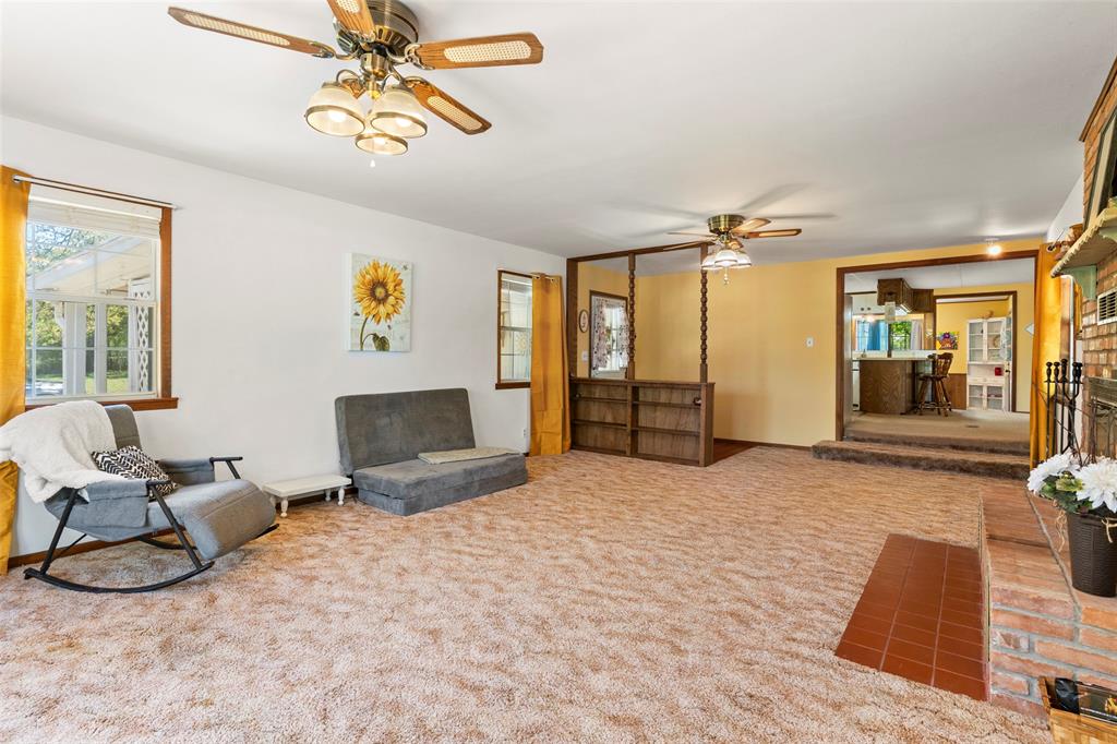 1500 County Road 404 Comanche, TX 76442 - Photo 10 of 39 a bedroom with furniture and a large window