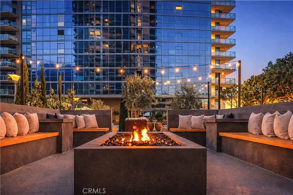 a terrace of a house with outdoor seating