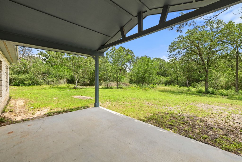 244 Woodway Elgin, TX 78621 - Photo 29 of 40 a view of a house with a big yard