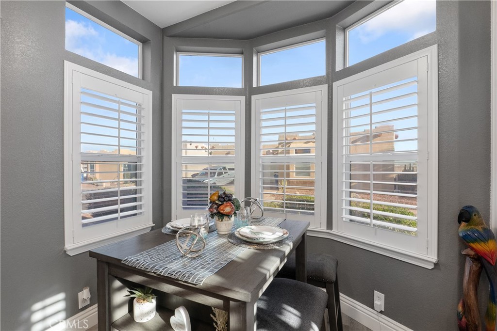 1188 Beach Drive Needles, CA 92363 - Photo 12 of 41 a view of a dining room with furniture and windows