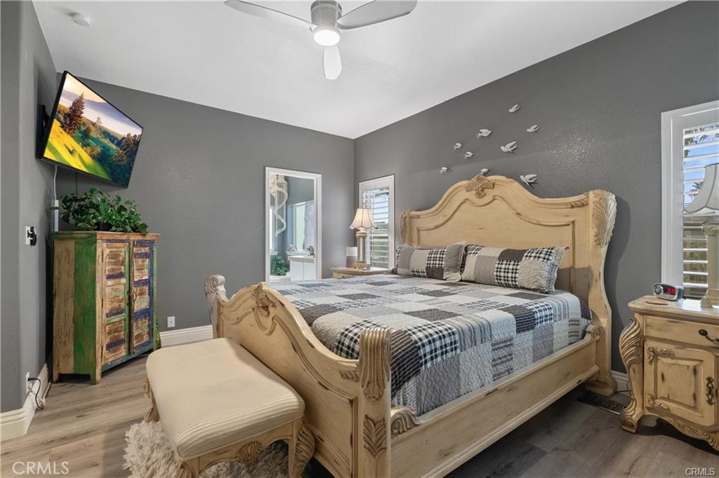 1188 Beach Drive Needles, CA 92363 - Photo 15 of 41 a bedroom with a bed and a flat screen tv
