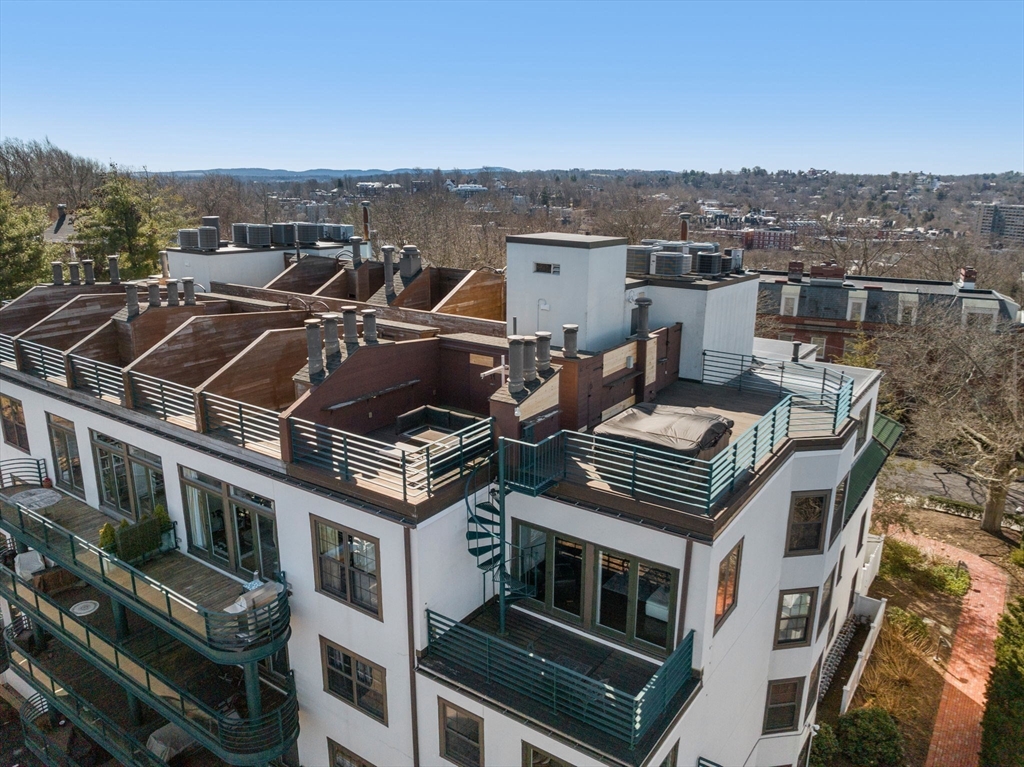 227 Summit Avenue, Unit E401 Brookline, MA 02446 - Photo 35 of 38 a view of a city with tall buildings