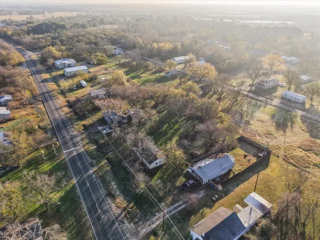 an aerial view of residential house with parking space