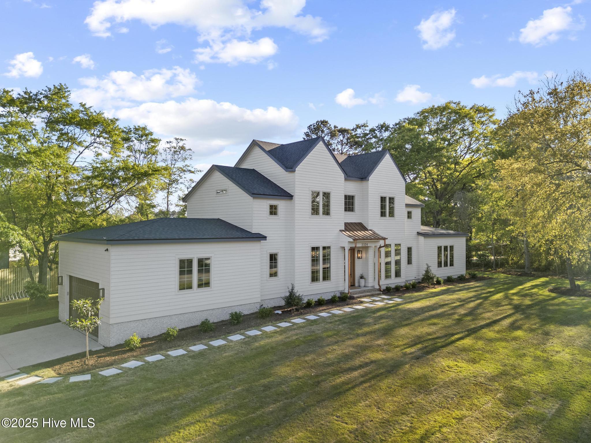 2324 Sloop Point Road Hampstead, NC 28443 - Photo 2 of 64 DJI_20250416180027_0081_D