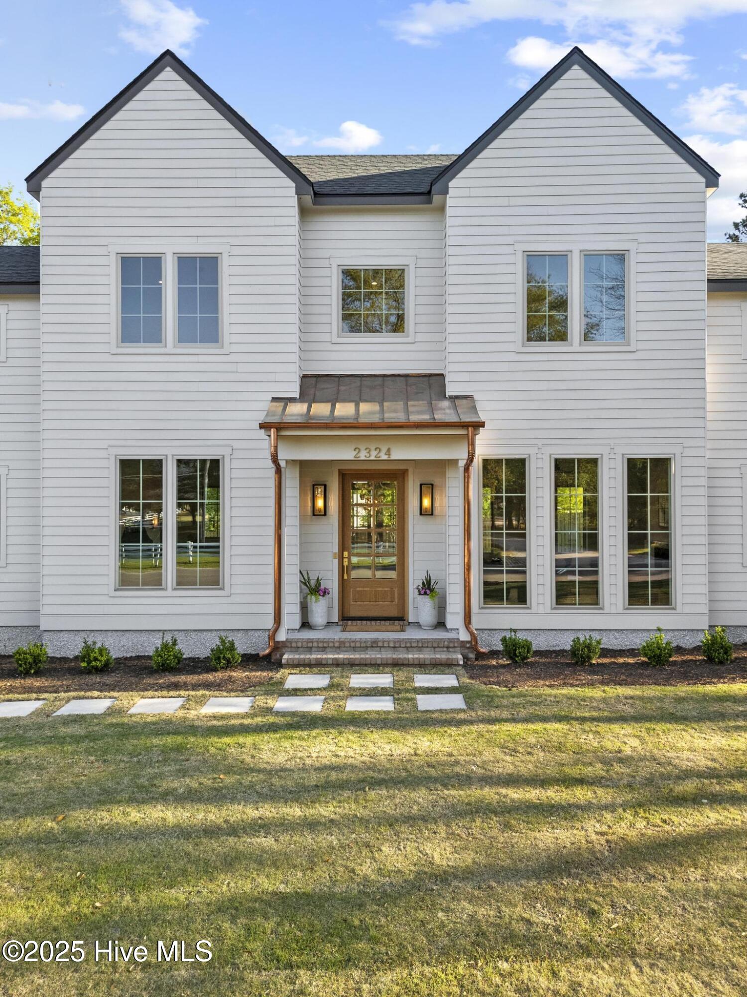 2324 Sloop Point Road Hampstead, NC 28443 - Photo 3 of 64 DJI_20250416180249_0096_D