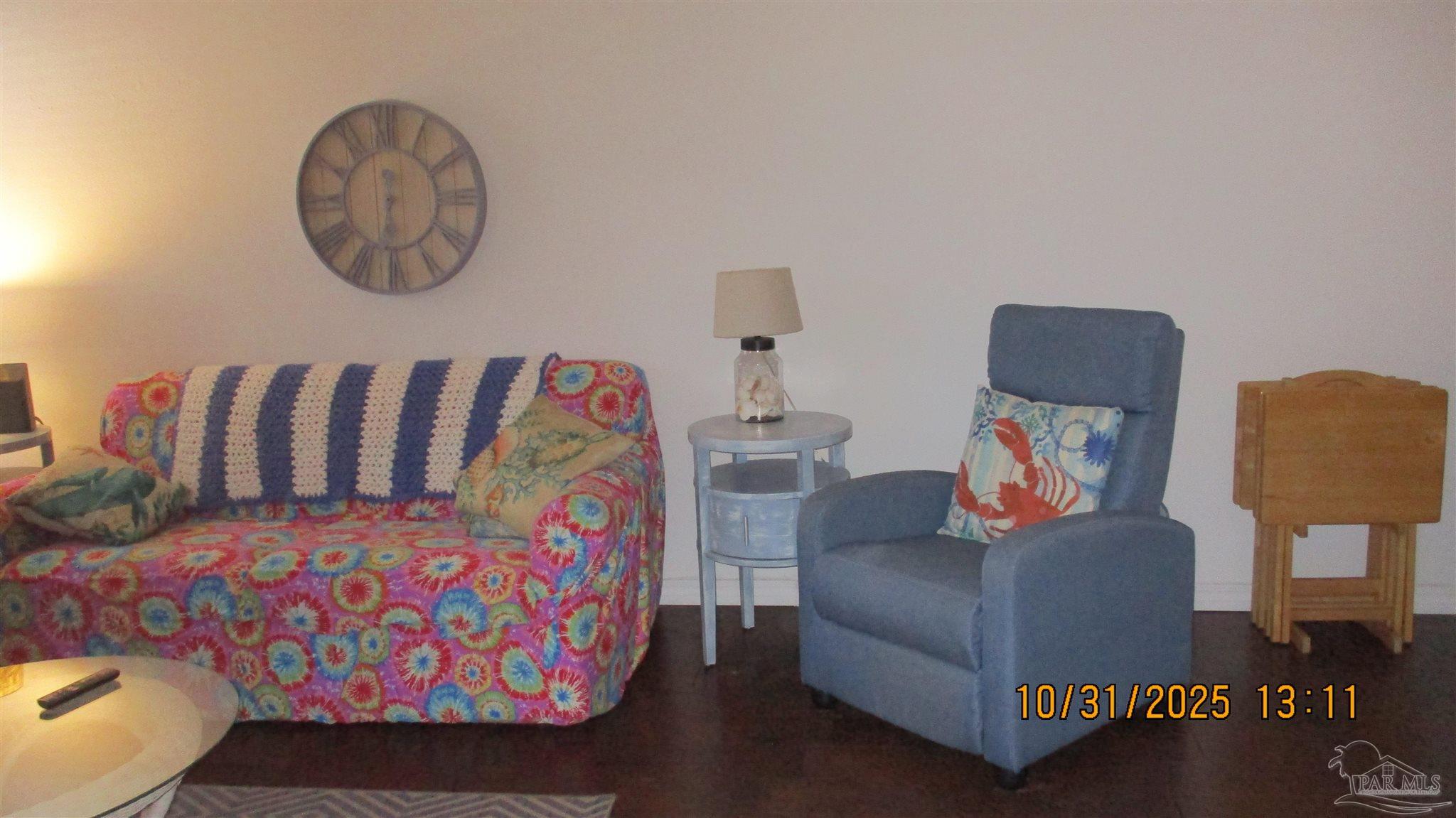 501 East Burgess Road, Unit C1 Pensacola, FL 32504 - Photo 4 of 16 a living room with furniture and a couch