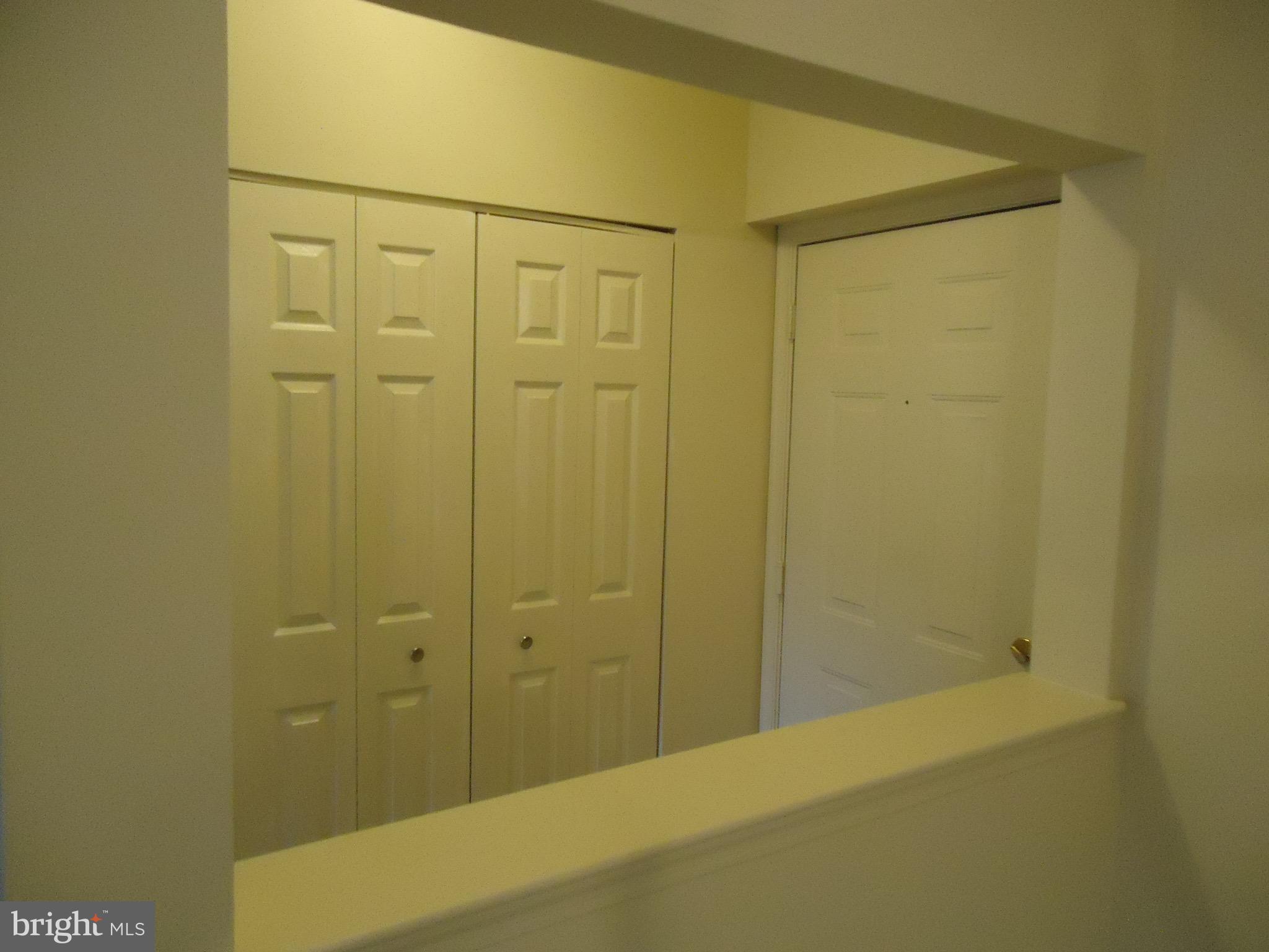 604 Moonglow Road, Unit 201 Odenton, MD 21113 - Photo 12 of 17 Entranceway - Coat Closet