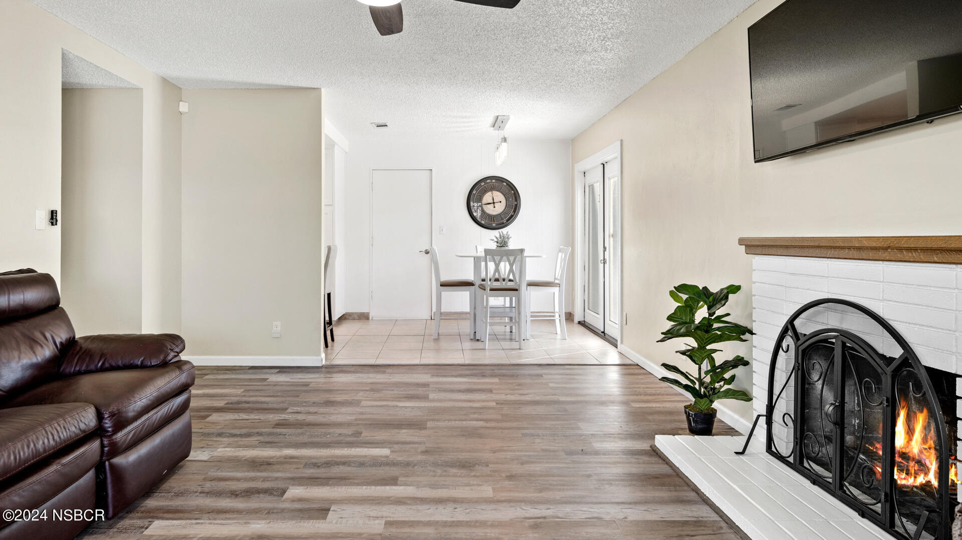 4030 Constellation Road Lompoc, CA 93436 - Photo 4 of 19 a living room with furniture and a fireplace