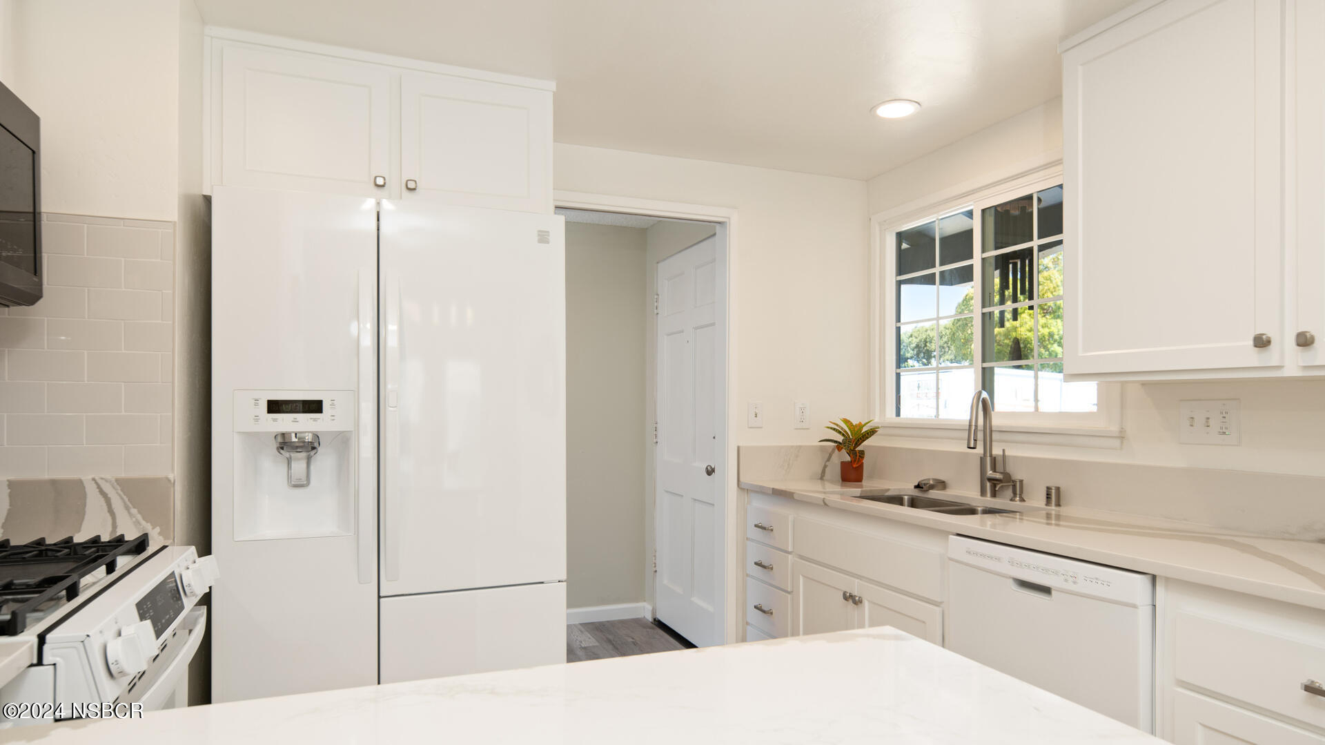 4030 Constellation Road Lompoc, CA 93436 - Photo 8 of 19 a spacious bathroom with a granite countertop sink mirror and double