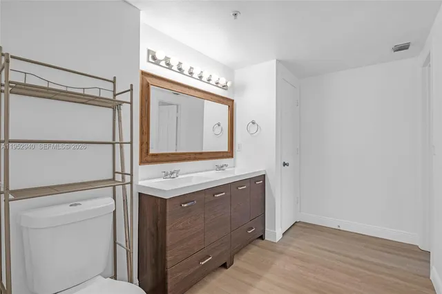 a room with a cabinets and a stove