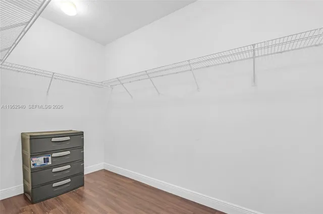 a view of an empty walk in closet