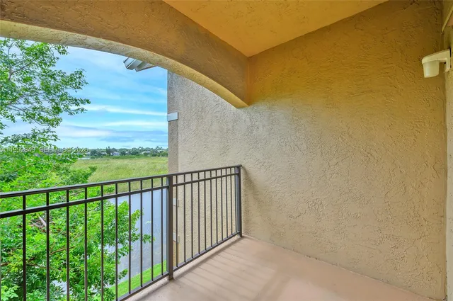 a view of a balcony with staircase