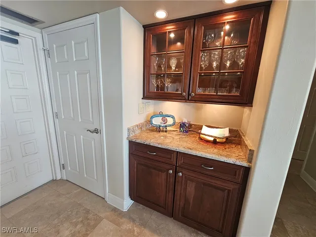 a bathroom with a sink and a window