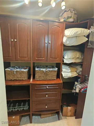 a room with chairs and dryer