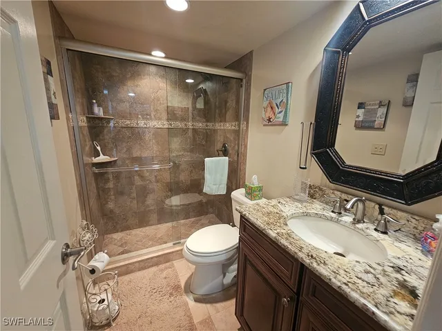 a view of front door with washer and dryer