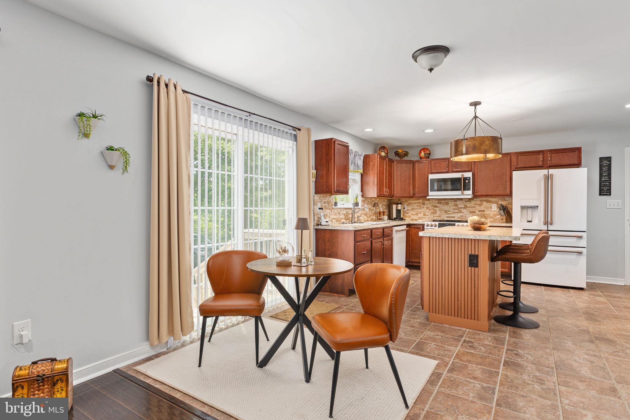 22088 Landora Bridge Road Ruther Glen, VA 22546 - Photo 36 of 122 Charming kitchen with modern flair.
