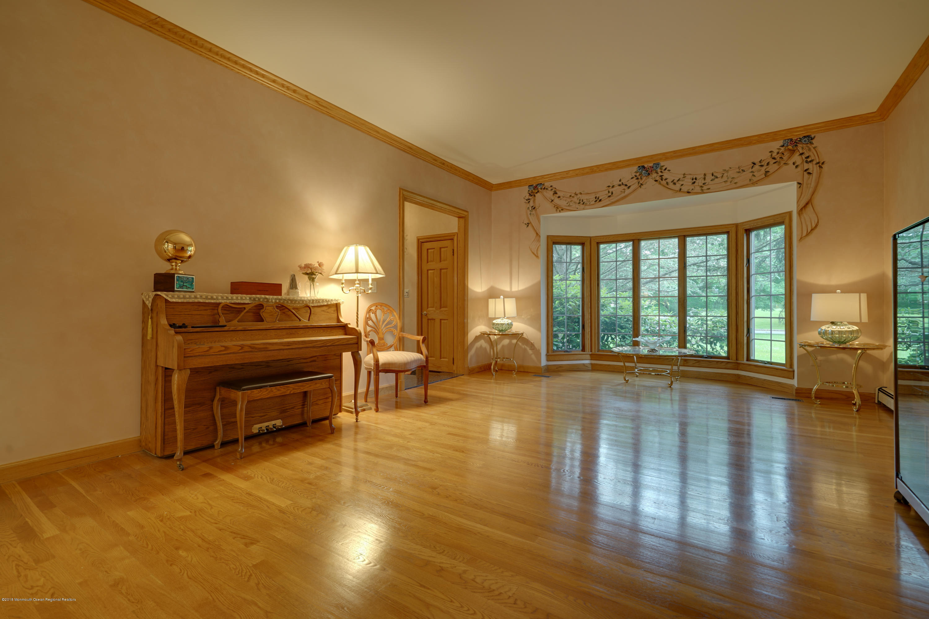 18 Riverside Lane Holmdel, NJ 07733 - Photo 19 of 53 Family Room has a Walk Out Bay Window