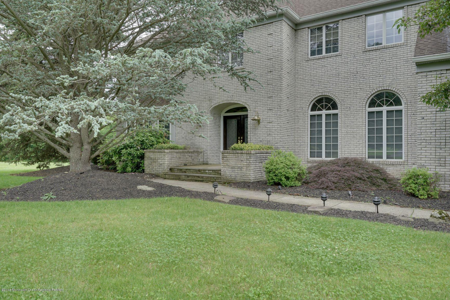 18 Riverside Lane Holmdel, NJ 07733 - Photo 3 of 53 Lighted Landscaped Welcomes You