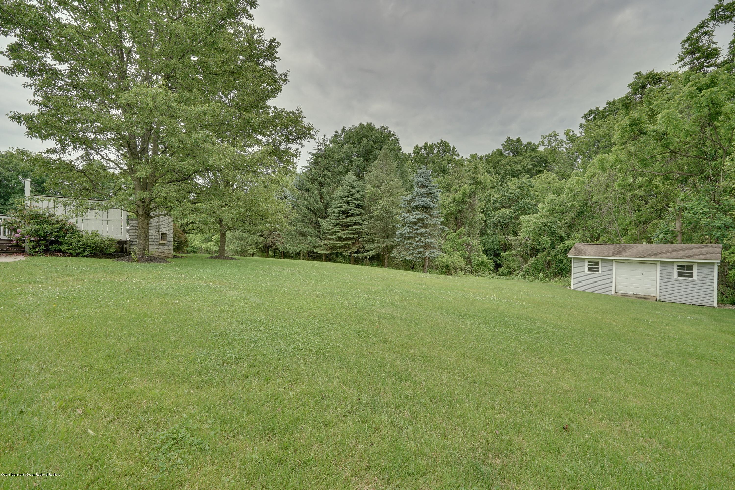18 Riverside Lane Holmdel, NJ 07733 - Photo 53 of 53 Backyard with Storage Shed