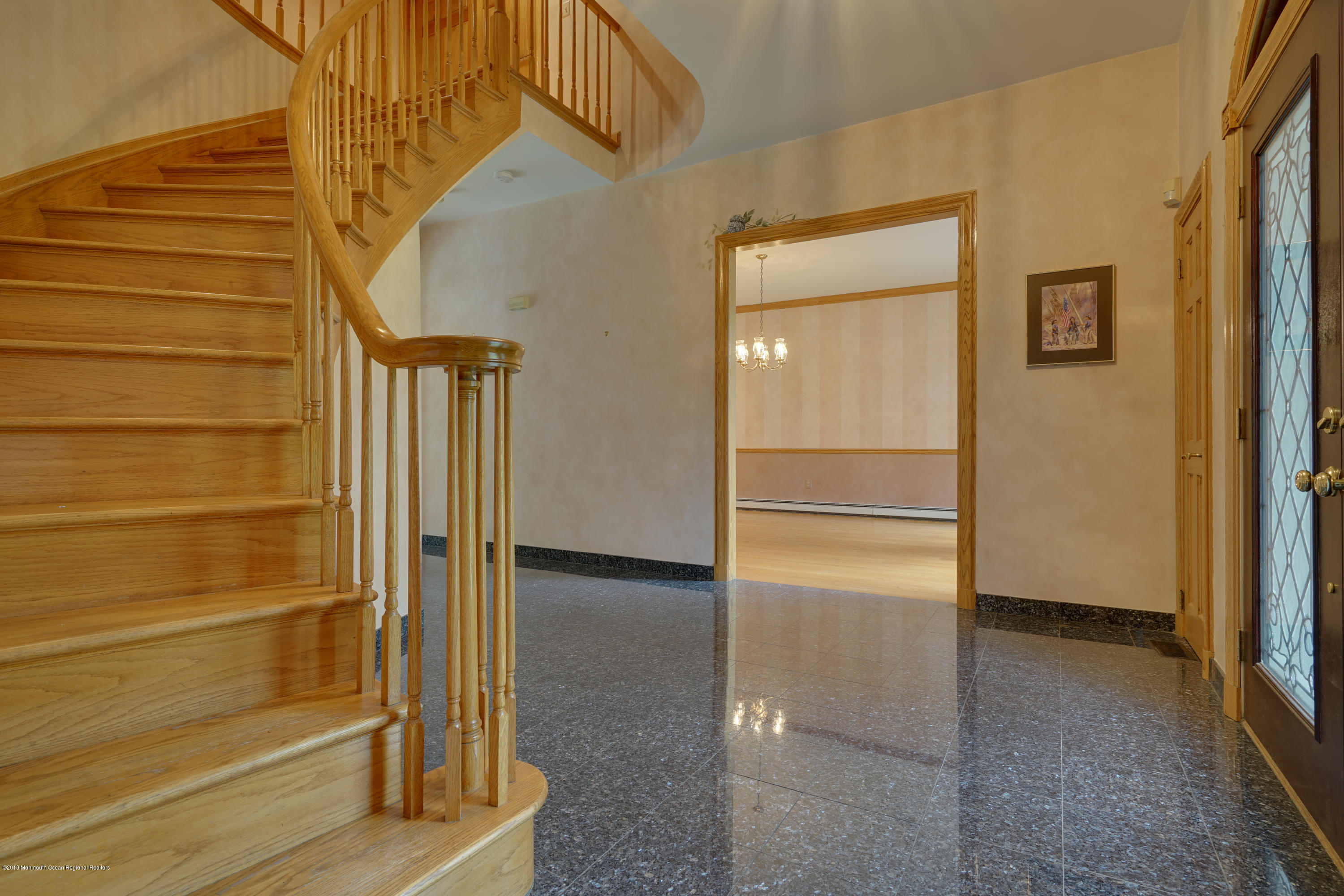 18 Riverside Lane Holmdel, NJ 07733 - Photo 6 of 53 Custom Curved Oak Staircase to 2nd Floor