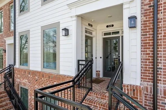 a view of balcony with wooden floor and windows