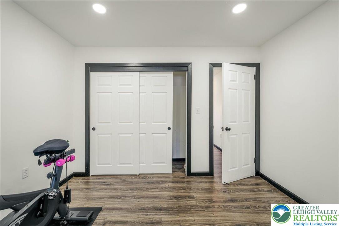 3260 Bluebird Drive Bushkill, PA 18324 - Photo 11 of 28 a view of a room with wooden floor