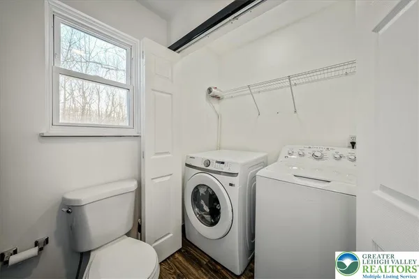 a utility room with dryer and washer