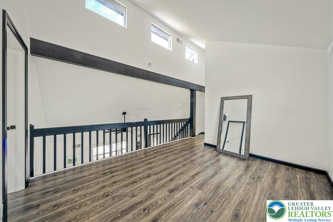 3260 Bluebird Drive Bushkill, PA 18324 - Photo 15 of 28 a view of hallway with wooden floor