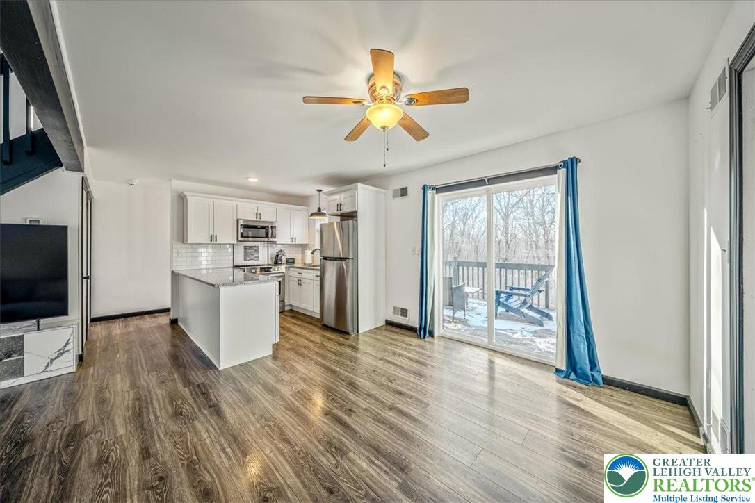 3260 Bluebird Drive Bushkill, PA 18324 - Photo 5 of 28 a view of a living room and a flat screen tv