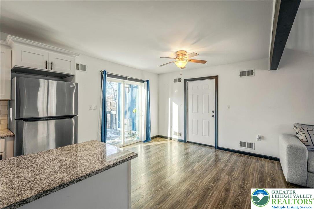 3260 Bluebird Drive Bushkill, PA 18324 - Photo 6 of 28 a view of a kitchen with wooden floor and a kitchen space