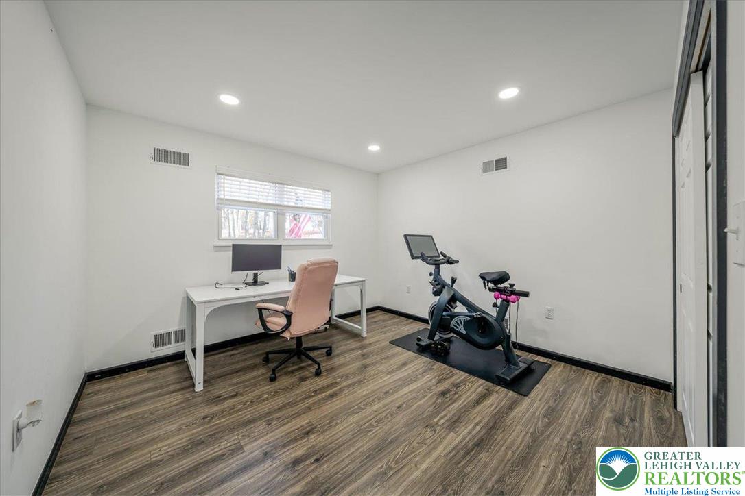 3260 Bluebird Drive Bushkill, PA 18324 - Photo 10 of 28 a view of a room with wooden floor and a window