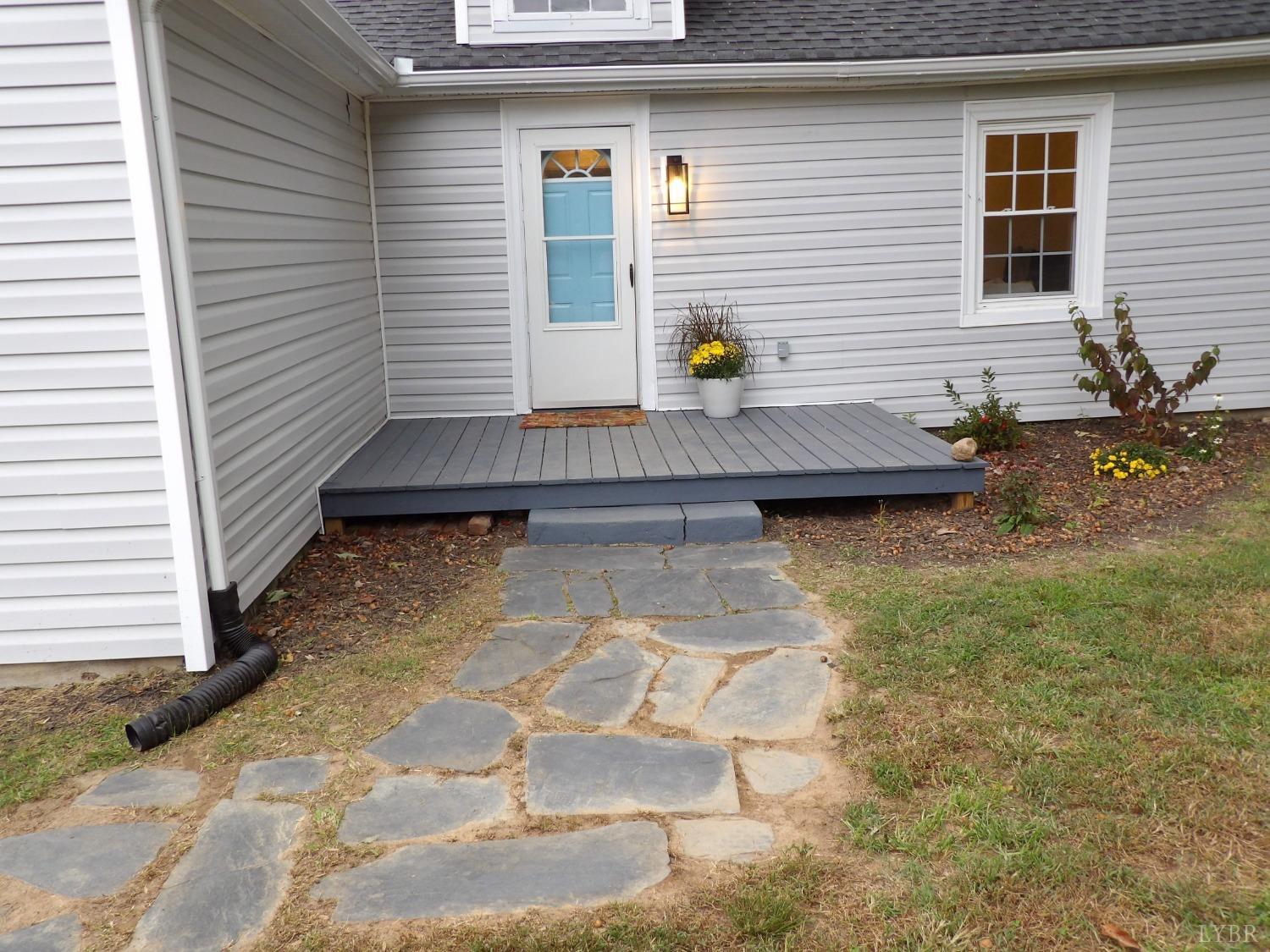 7143 Abilene Road Farmville, VA 23901 - Photo 2 of 38 a view of a backyard with chairs