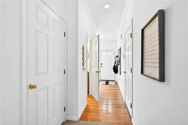 a hallway with white doors