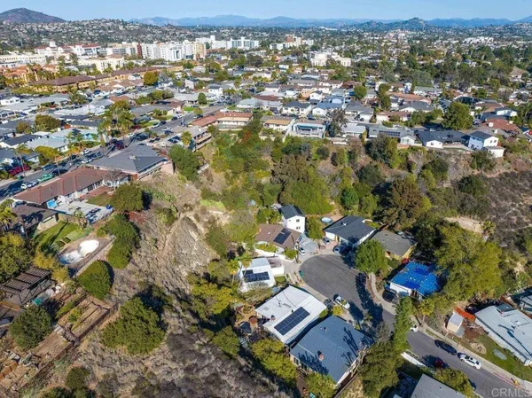 an aerial view of a city with lots of residential buildings
