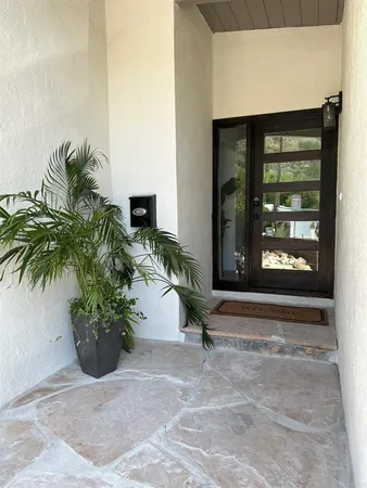 a view of entrance gate of the house