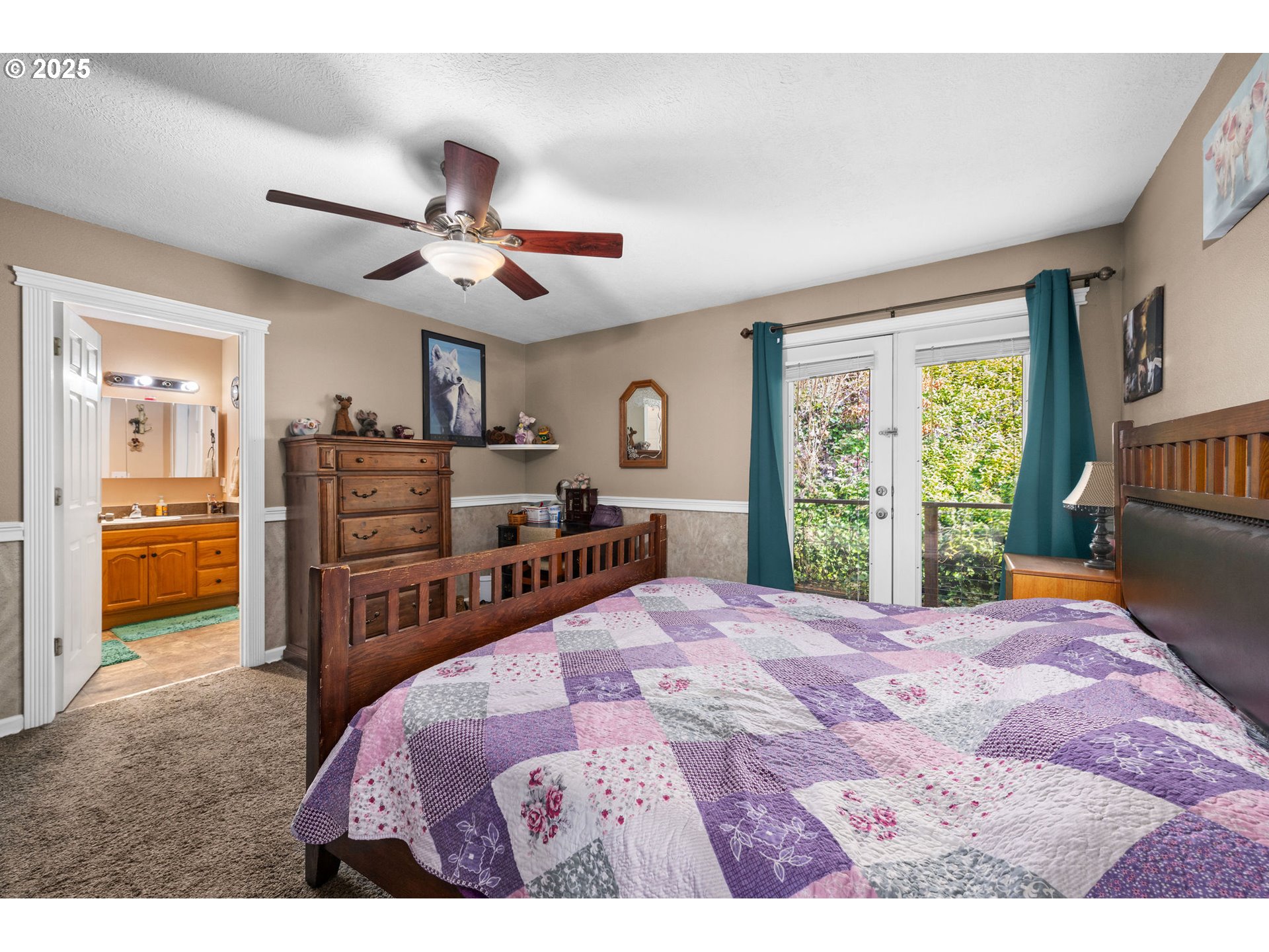 1390 Swedetown Road Clatskanie, OR 97016 - Photo 13 of 42 a bedroom with a bed dresser and a large window