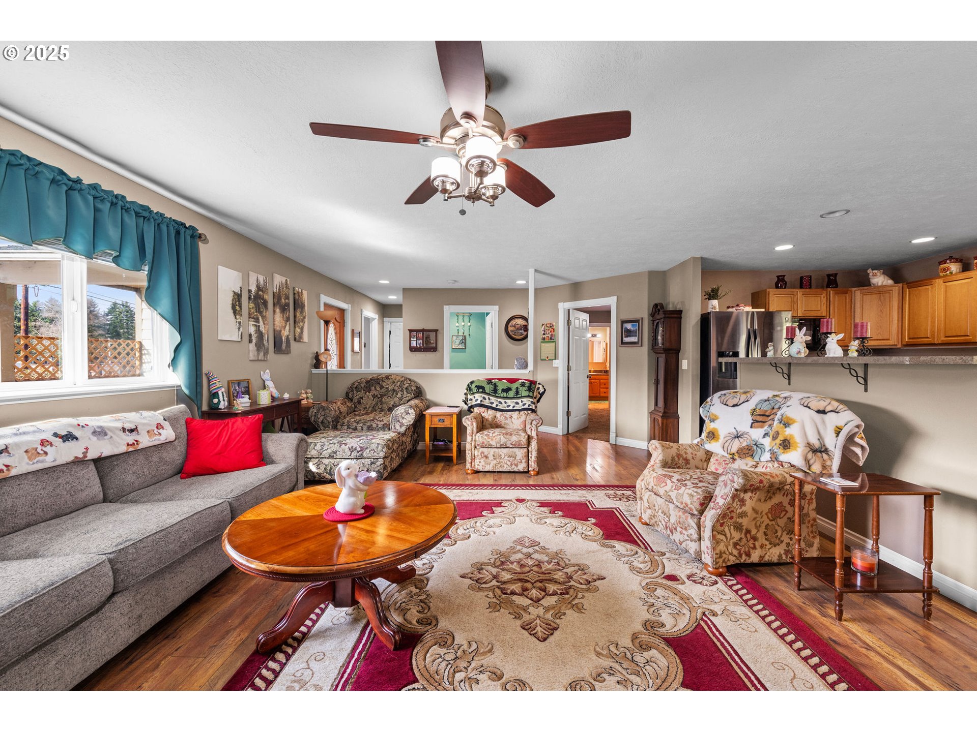 1390 Swedetown Road Clatskanie, OR 97016 - Photo 19 of 42 a living room with furniture and wooden floor